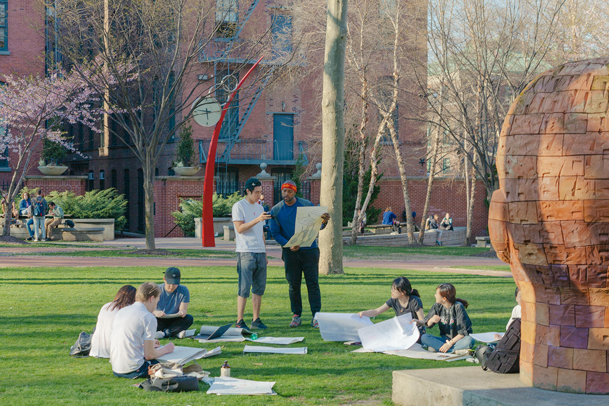 students sketching outside
